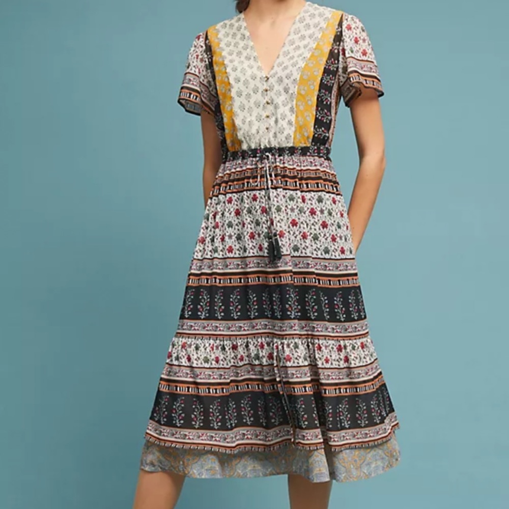 One September dress bought from Anthropologie. Worn twice. In great condition.